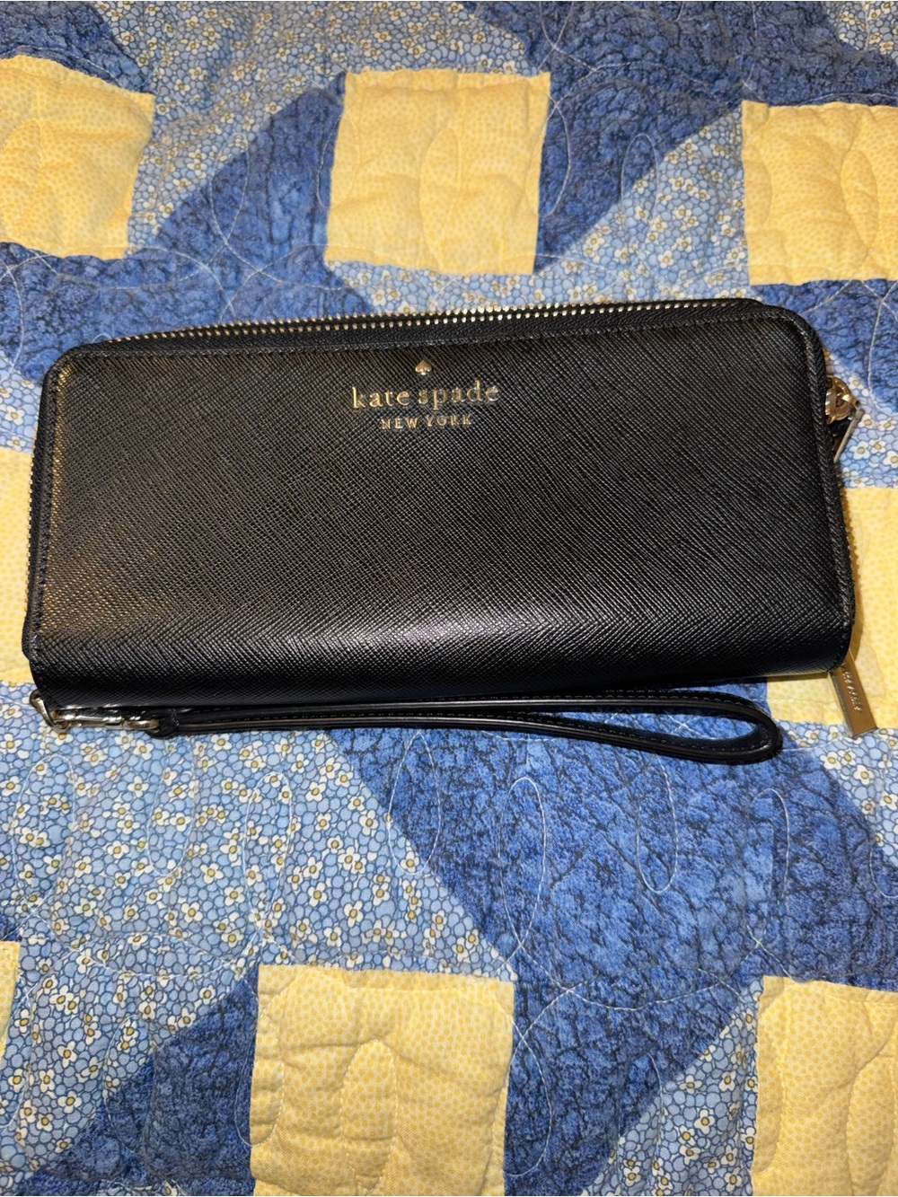 kate spade black zip-around wristlet wallet with gold logo